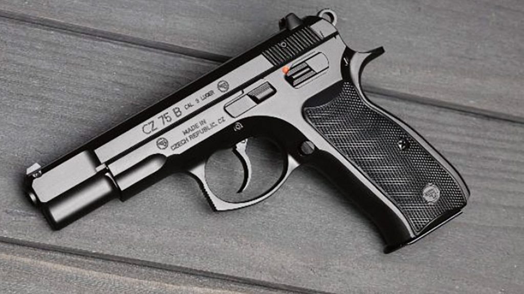 A CZ 75 B pistol lying on a timber surface