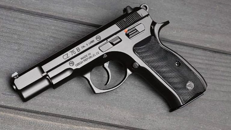 A CZ 75 B pistol lying on a timber surface
