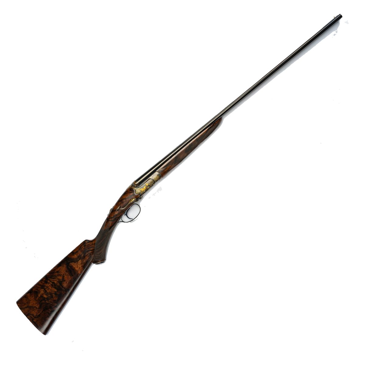 Karl Hauptmann triple-barrelled .410 shotgun with gold-engraved action and dark walnut stock